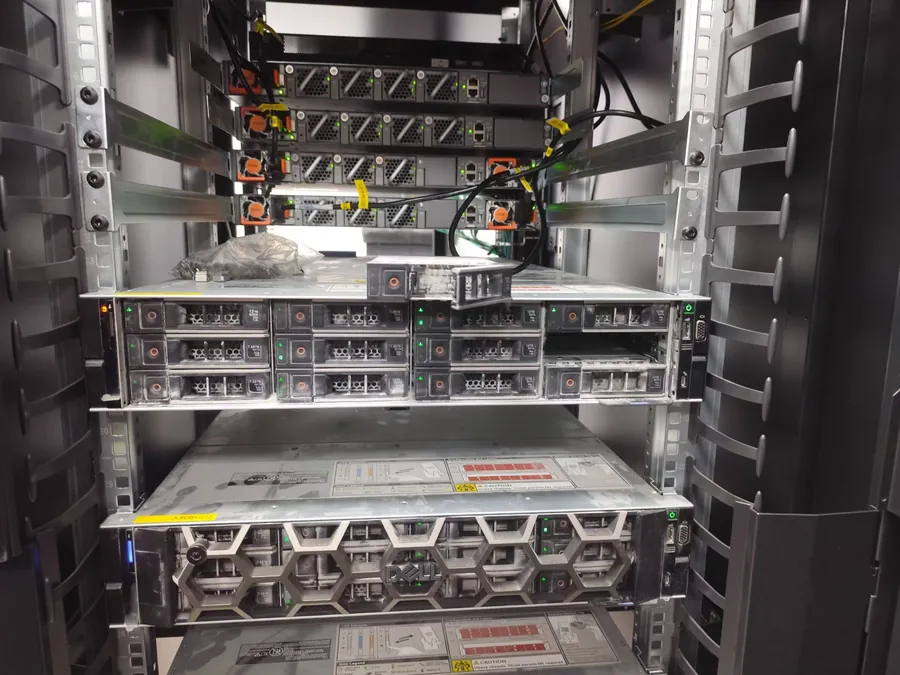 Dell PowerEdge R750 servers in a rack during on-site maintenance