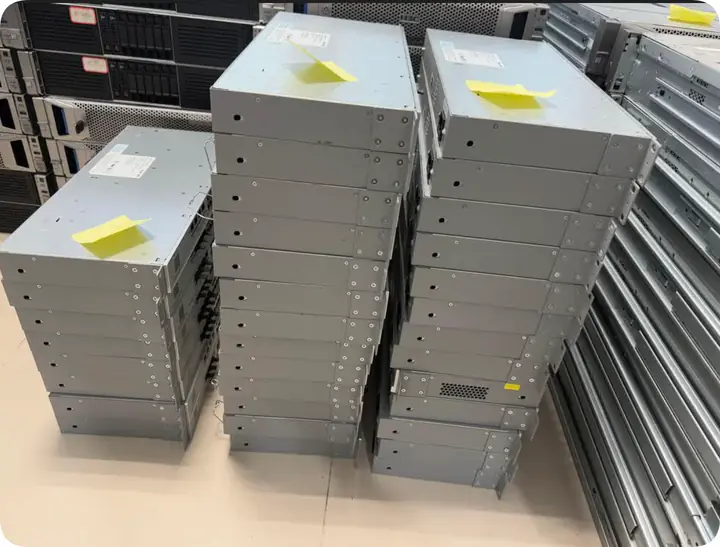 Labeled enterprise equipment awaiting inspection and grading