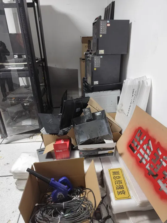 Retired IT equipment staged for inventory and asset recovery assessment