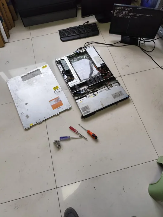 Rackmount server opened for hardware inspection during on-site assessment